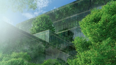 Die Schwammstadt - Effektiver Schutz vor Hochwasser und Hitze? : Begr&uuml;ntes B&uuml;rogeb&auml;ude mit vielen B&auml;umen